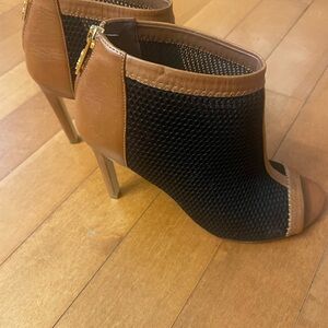 Cole Haan Black and Tan Heeled Boots